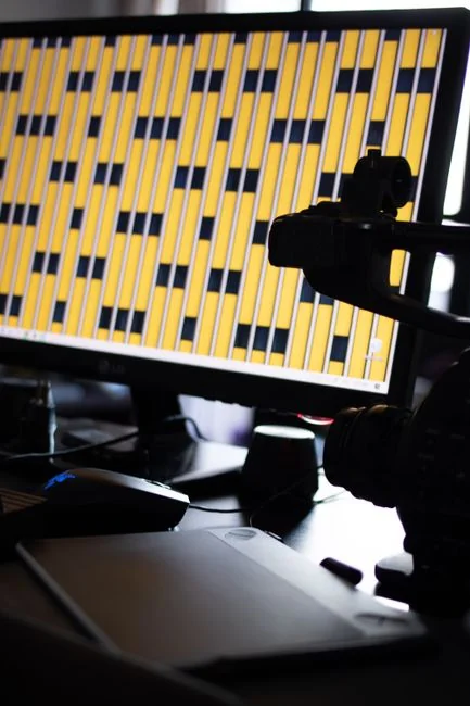 A laptop displaying an analytics dashboard with real-time data tracking and analysis tools.